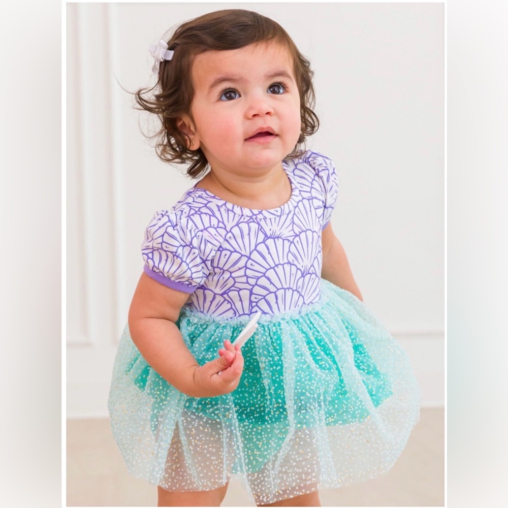 Rufflebutts Short Sleeve Princess Bow Twirl Romper Dress
Color: Magical Mermaid